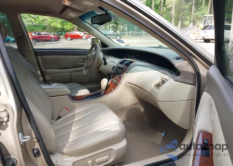 2002 Toyota Avalon Xls z USA, uszkodzony, nr VIN 4T1BF28B62U239889